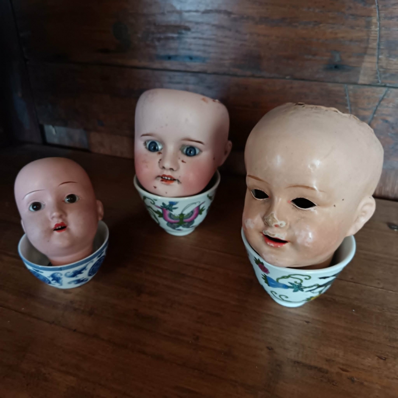 T�tes de poup�es anciennes