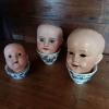 T�tes de poup�es anciennes