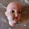 T�tes de poup�es anciennes