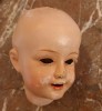 T�tes de poup�es anciennes